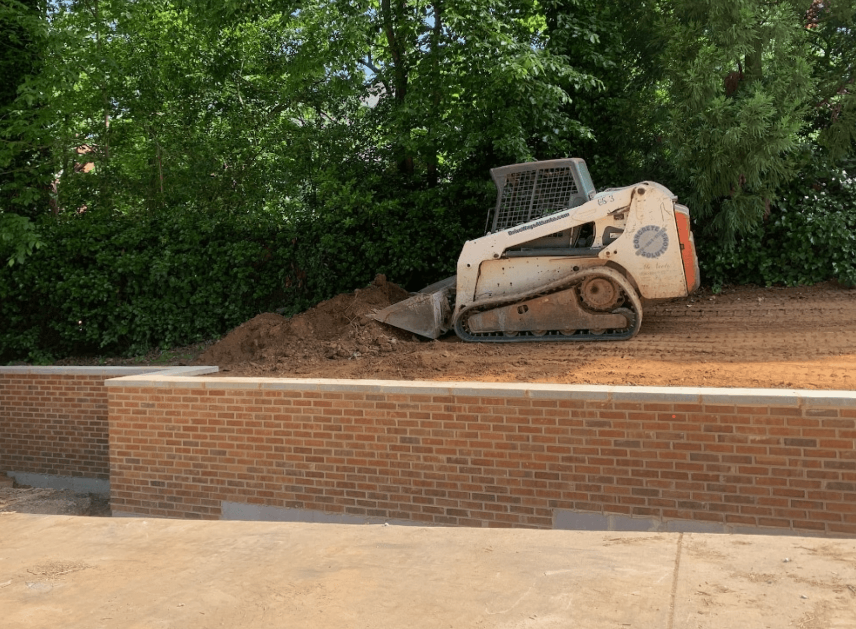 Brick retaining wall installation