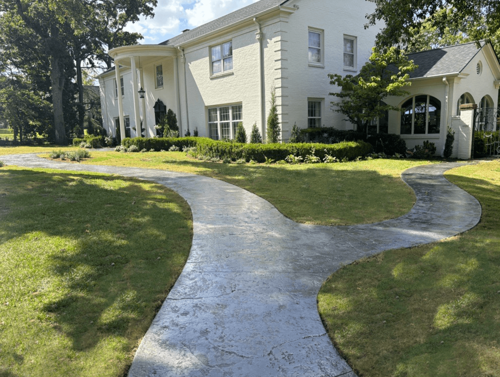 Concrete walkway at a home's front entrance
